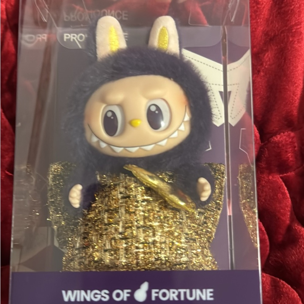 Wings of Fortune Action Figure with Gold and Black Outfit